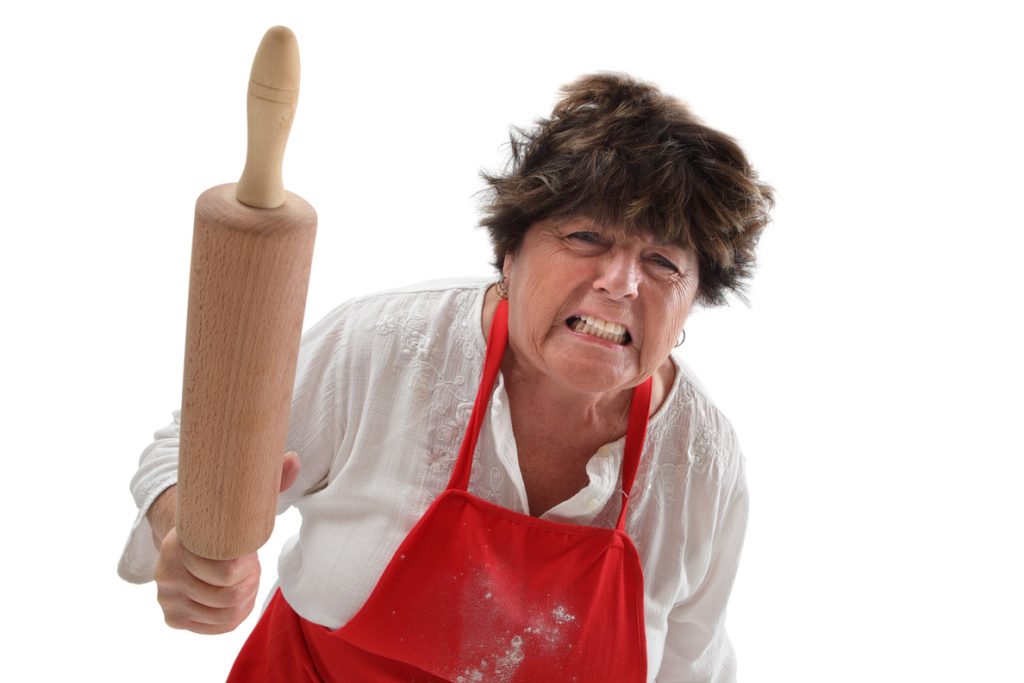 Angry grandmother with rolling pin