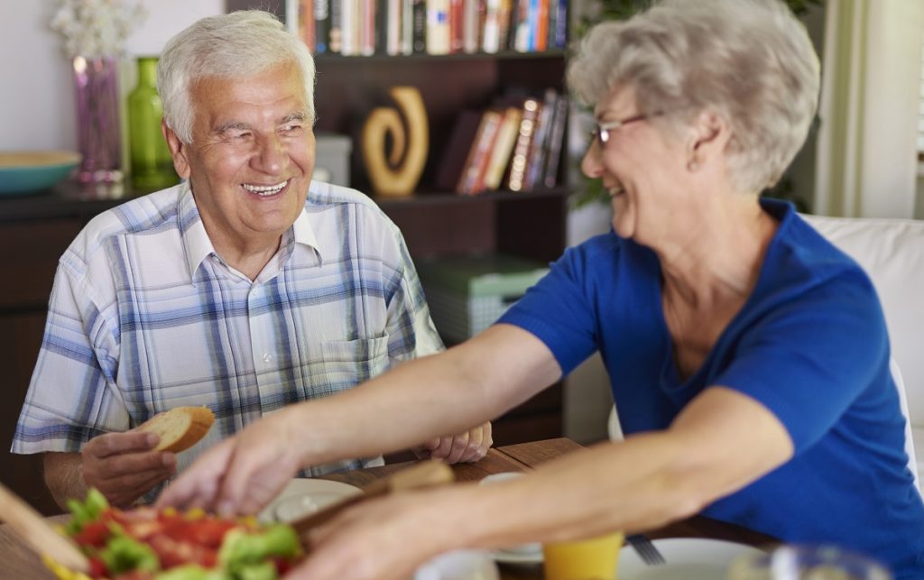 Senior Couple Eating Delicious Breakfast