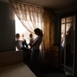 Mom And Kids. Happy Family Photo At Home.